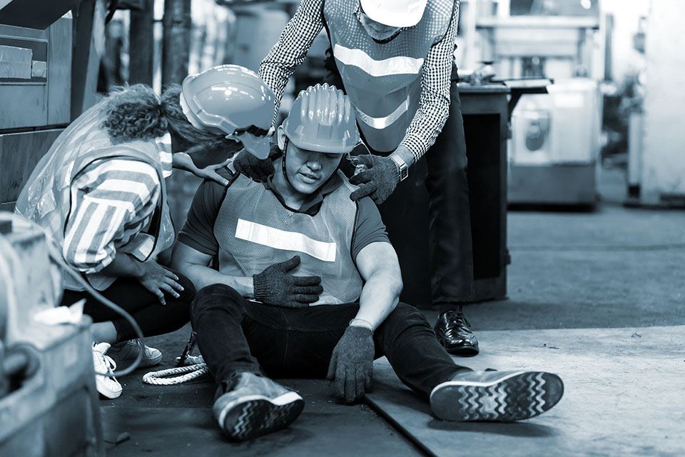  Injured constructions worker is held up by co-workers