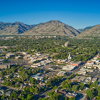 A valley shown from above while being lit up by the sun